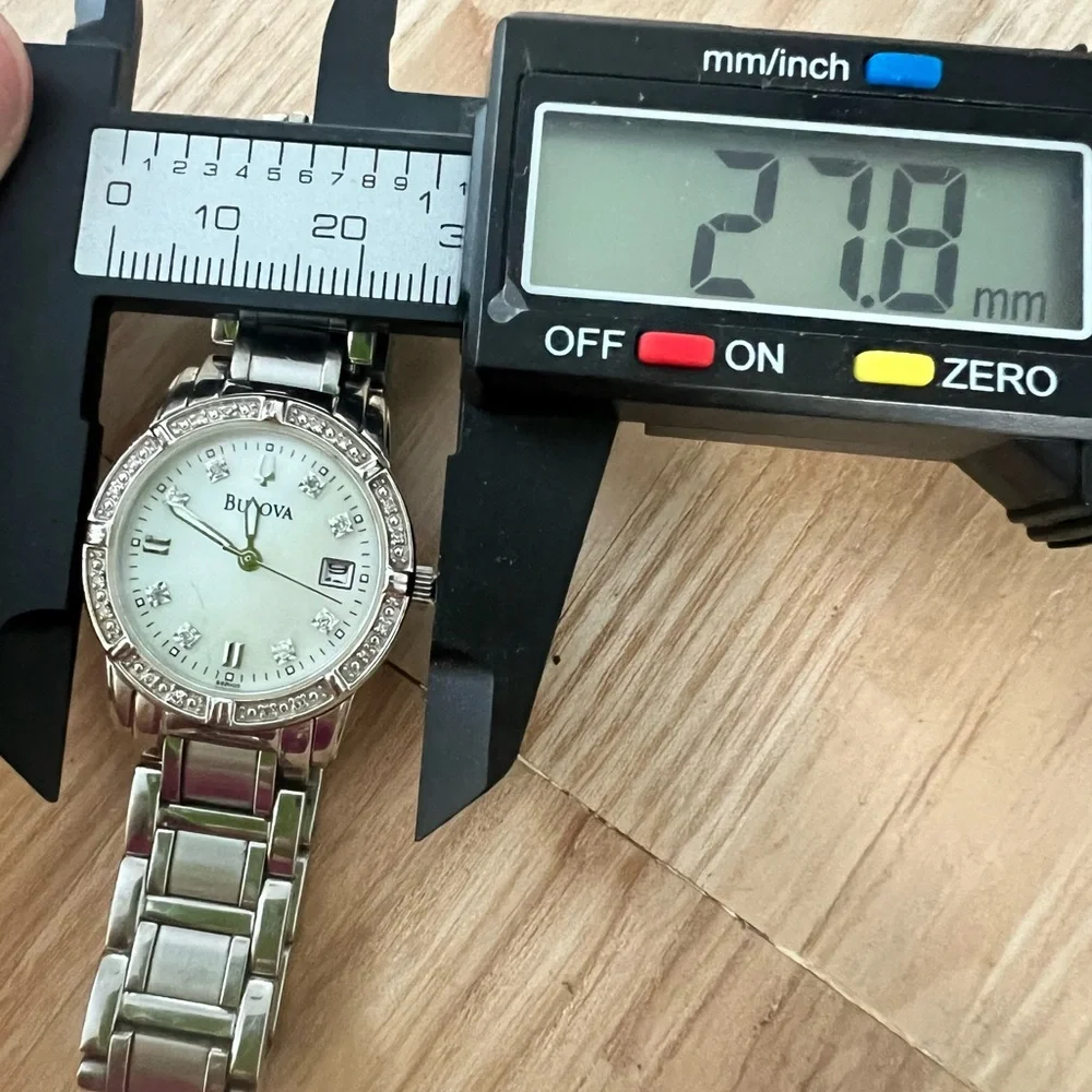 Bulova ladies silver tone diamond dress watch NEW BATTERY